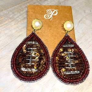 Sequin football earrings plunder design